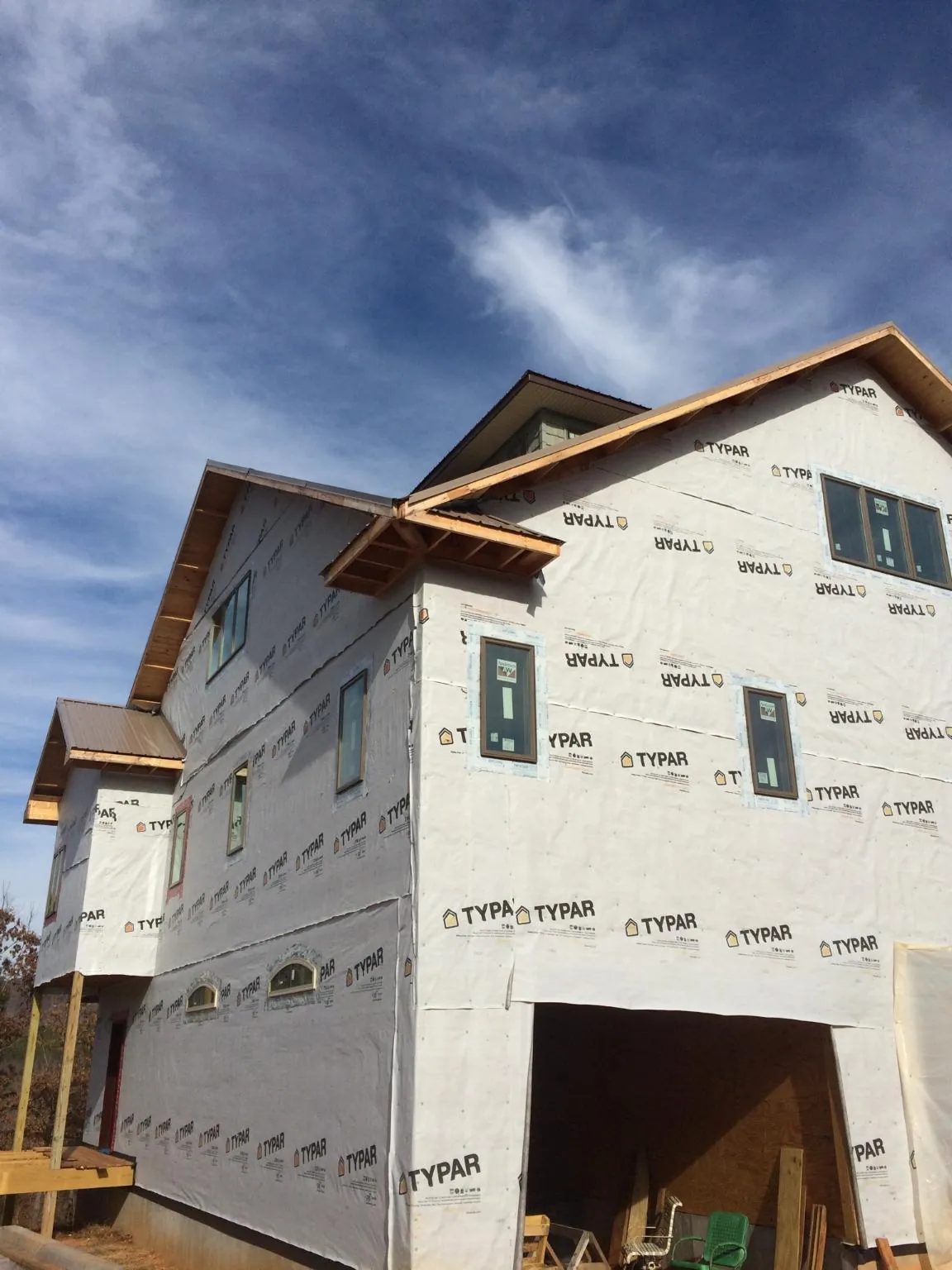 Stick built house wrapped in Typar with new roof framing and dormers in Tracy City